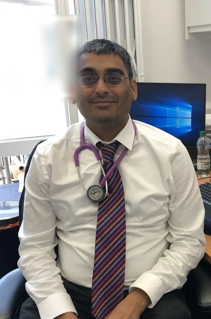 Dr Yogesh Patel, NHS GP partner, in his consulting room